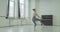 Ballerina practicing fouette turn in dance studio