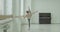 Ballerina practicing grand battement exercise