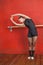 Ballerina Stretching With Hands Raised In Dance Studio