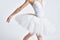 Ballerina white tutu dance exercise performance light background