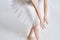 Ballerina white tutu dance exercise performance light background