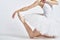 Ballerina in white tutu elegant dance performed sensuality silhouette light background