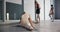 Ballerina, woman and stretch with warm up in studio for health or fitness with hip opener for dancer. Ballet, elegance
