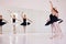 Ballerinas dancing or practicing in a dance studio or class ready for a performance. Elegant dancers training ballet