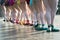 Ballerinas feet dancing on ballet shoes with several colors on s