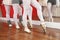 Ballerinas Performing Pointe On Wooden Floor