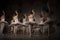 Ballerinas in white tutus show dance movement. The girls are doing ballet. Ballet dance class on stage. There are many girls in