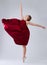 Ballet, dance and woman training for performance, wellness and hobby on grey studio background. Ballerina, creative