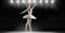 Ballet dancer dancing with stadium star lights