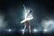 Ballet dancer dancing on the stage in theatre