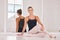 Ballet dancer, performance artist and woman showing her flexibility, grace and fit ballerina in a practice studio. Happy