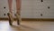 Ballet dancer`s legs on pointe