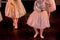 Ballet Dancers with Classical Dresses performing a ballet on Blur Background