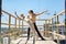 Ballet dancers posing at concrete balcony