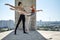 Ballet dancers posing at unfinished building