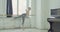 Ballet dancers practicing developpe at barre