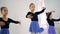 Ballet exercises performed by three little girls