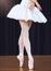 Ballet feet or legs dancing or training or practice in a dance studio, stage or class. Professional elegant dancer or