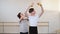 Ballet Gymnastics Class: Teacher Choreographer Helps Student to Improve Exercise