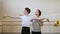 Ballet Gymnastics Class: Teacher Choreographer Helps Student to Improve Exercise