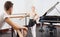 Ballet partners dancing gracefully together in the ballet studio