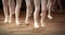 Ballet school fragment with little girls legs