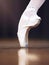 Ballet shoes and dance woman floor balance with flexible motion fitness footwear close up. Professional ballerina