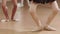 Ballet training - little ballerina girls practising their pointe stands
