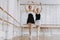 Ballet Training of Little Girl with Teacher Indoor