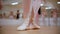 Ballet training - little girl training her stands on pointe shoes