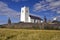 Ballintoy Church of Ireland above barley field, Antrim