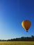 Balloon against clear blue sky