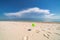 Balloon on background of ocean. Beach. Clouds