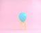 Balloon blue pastel with yellow chair on pink color background