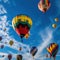 balloon festival .colorful balloons against a blue sky with clouds