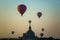 Balloon flies over Sulamani Guphaya temple at dawn