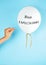 Balloon with High expectation text and the hand with the needle directed to the balloon
