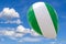 Balloon with the image of the national flag of Nigeria, flying through the blue sky. 3D rendering, illustration with copy space