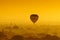 Balloon over plain of Bagan in misty morning, Myanmar