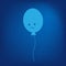 Balloon with a sad emoticon on an illuminated background in trendy monochrome blue. Blue Monday Day