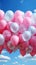 Balloon symphony pink and blue pastel balloons harmonize against a gentle background