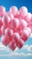 Balloon symphony pink and blue pastel balloons harmonize against a gentle background