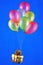Balloons are colorful and gift. The colors green, yellow, red, blue - made of latex. Inflated with air or helium, have the ability
