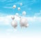 Balloons floating in blue sky with fluffy white clouds