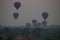 Balloons flying over the ancient pagodas