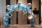 Balloons in sea and summer concept. Blue and white balloons for interior decoration with starfish, life buoy and seashell.