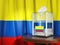 Ballot box with flag of Colombia and voting papers. Colombian