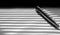 Ballpoint pen closeup on black-and-white background