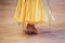 Ballroom dancer`s feet on the parquet