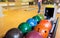 Balls on ball return system in bowling club